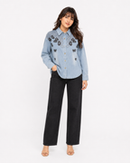 Front view of butterfly embroidered denim shirt
